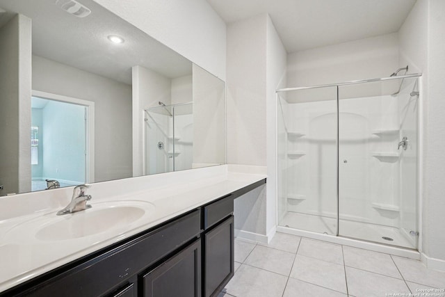 11518 Biddle, San Antonio, TX 78253 - full bathroom with a shower stall, vanity, and tile patterned floors