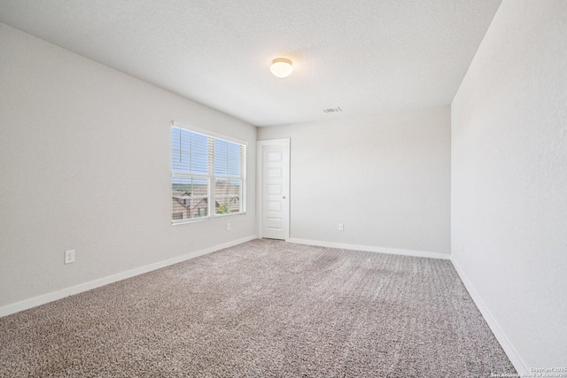 11518 Biddle, San Antonio, TX 78253 - carpeted empty room featuring baseboards and a textured ceiling