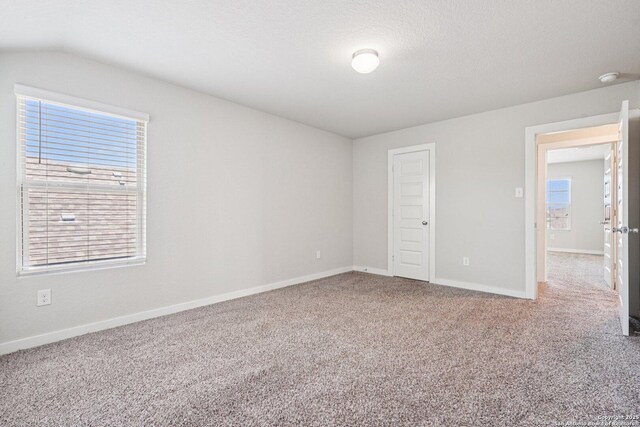 11518 Biddle, San Antonio, TX 78253 - carpeted spare room with healthy amount of natural light and a smoke detector