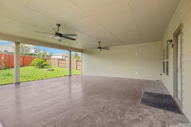 11518 Biddle, San Antonio, TX 78253 - fenced backyard with ceiling fan and a patio area