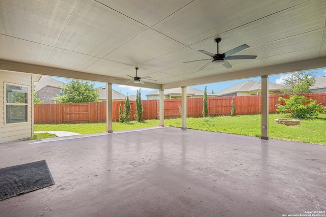 11518 Biddle, San Antonio, TX 78253 - fenced backyard featuring a ceiling fan and a patio area