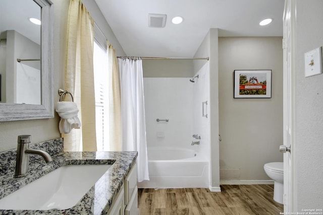 7259 Sunlit Trl, San Antonio, TX 78244 - bathroom with vanity, shower / bathtub combination with curtain, and wood finished floors