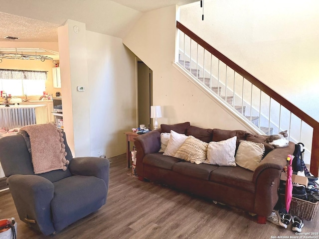 11733 Spring Rdg, San Antonio, TX 78249 - living room with wood finished floors and stairs