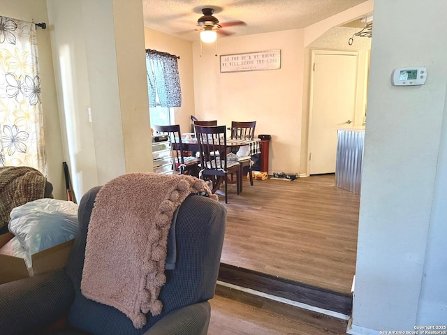 11733 Spring Rdg, San Antonio, TX 78249 - dining space with wood finished floors and ceiling fan