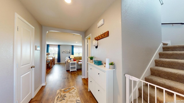 408 River Sta, Cibolo, TX 78108 - corridor with arched walkways, wood finished floors, and stairway