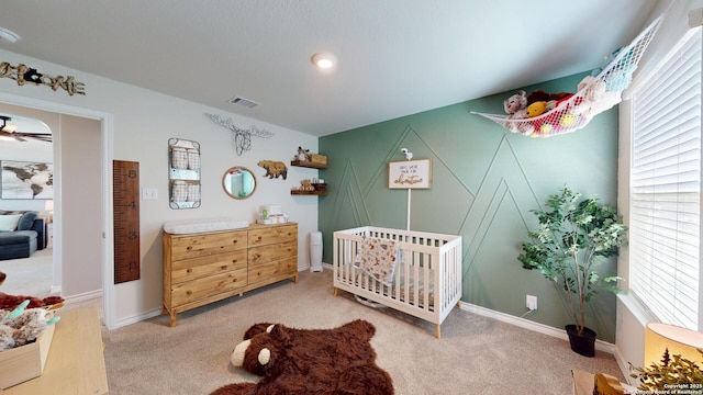 408 River Sta, Cibolo, TX 78108 - bedroom featuring a nursery area and carpet flooring