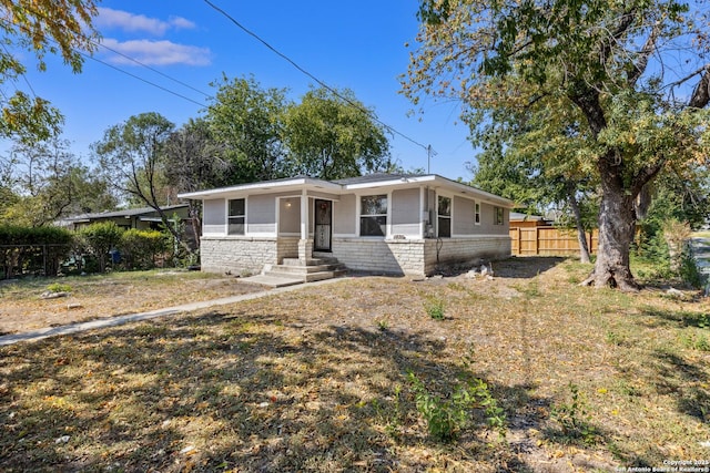 1231 NW 36th St, San Antonio, TX 78228 - view of front of house with stone siding and entry steps