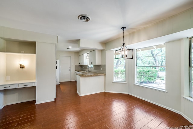 100 End Gate, Shavano Park, TX 78231 - kitchen featuring freestanding refrigerator, healthy amount of natural light, and dark wood-style floors
