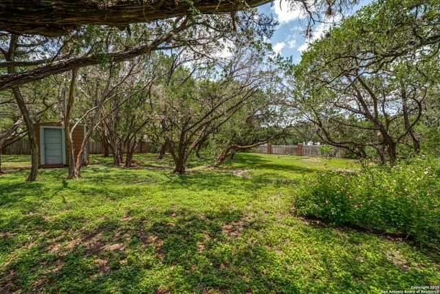 100 End Gate, Shavano Park, TX 78231 - view of yard with a storage unit