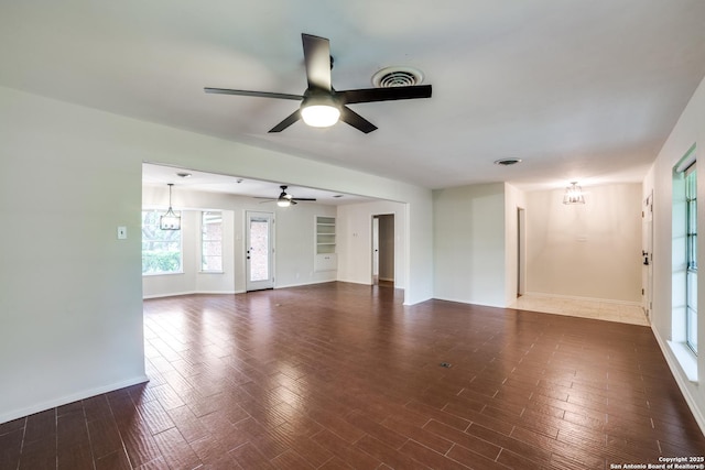 100 End Gate, Shavano Park, TX 78231 - unfurnished living room with a ceiling fan, a chandelier, and wood finished floors