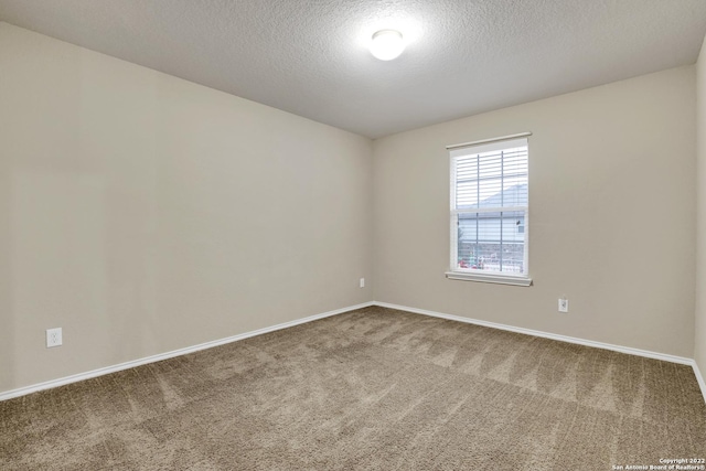 11708 Northern Star, Schertz, TX 78154 - carpeted spare room with baseboards and a textured ceiling