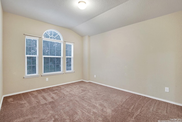 11708 Northern Star, Schertz, TX 78154 - carpeted empty room featuring vaulted ceiling and baseboards
