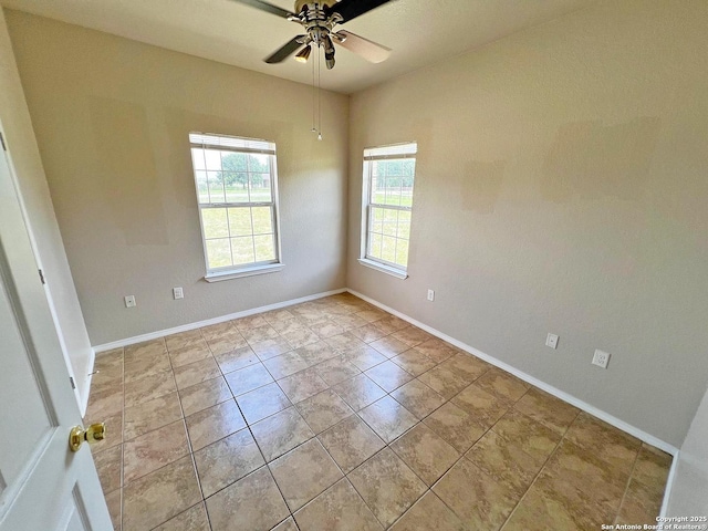 168 Great Oaks Blvd, La Vernia, TX 78121 - unfurnished room featuring a ceiling fan and light tile patterned floors