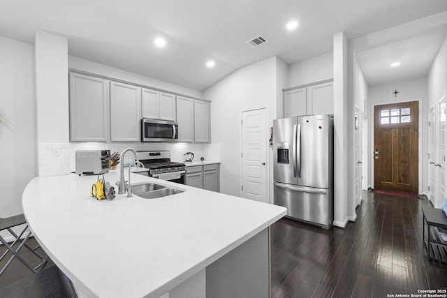 11631 Troubadour, San Antonio, TX 78245 - kitchen with stainless steel appliances, a peninsula, light countertops, recessed lighting, and tasteful backsplash