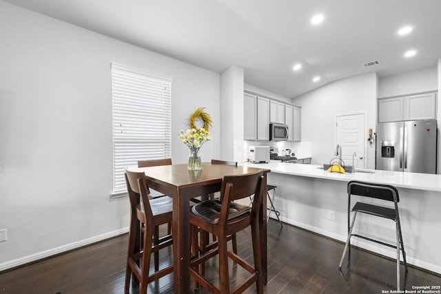 11631 Troubadour, San Antonio, TX 78245 - dining area featuring recessed lighting, dark wood-style flooring, and lofted ceiling