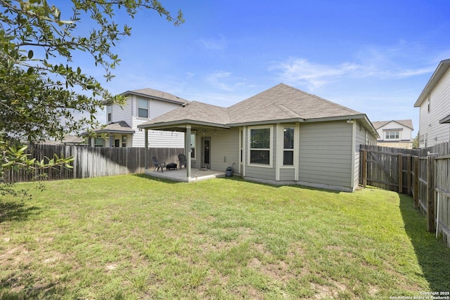 11631 Troubadour, San Antonio, TX 78245 - back of house with a patio area, a fenced backyard, and a shingled roof