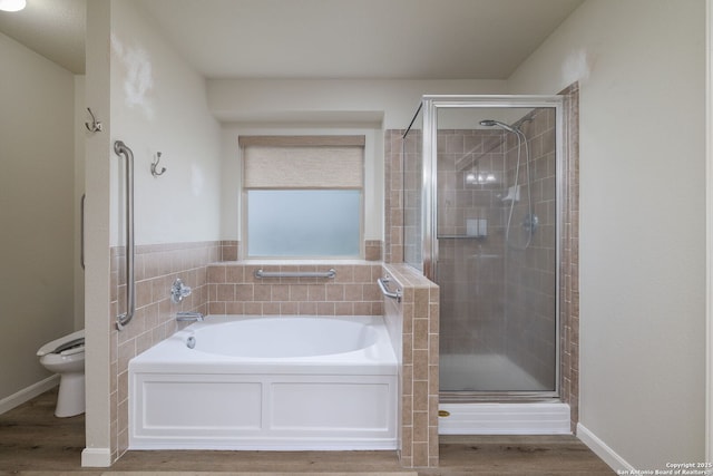 173 Great Oaks Ln, Vernia, TX 78121 - full bathroom featuring a garden tub, wood finished floors, and a stall shower