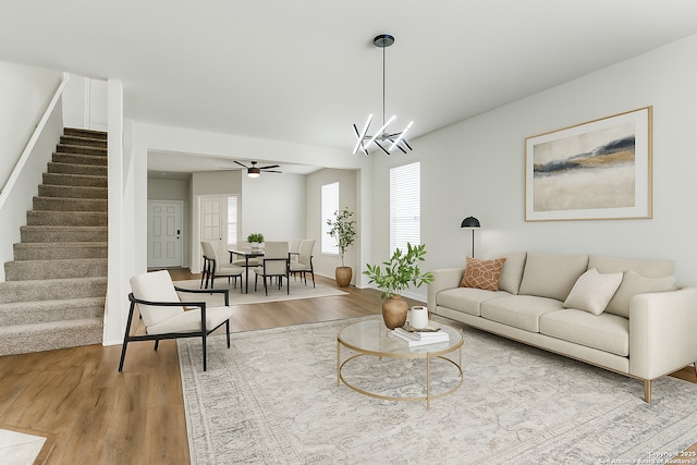 24230 Invitation Oak, San Antonio, TX 78261 - living area featuring stairs, wood finished floors, and a ceiling fan