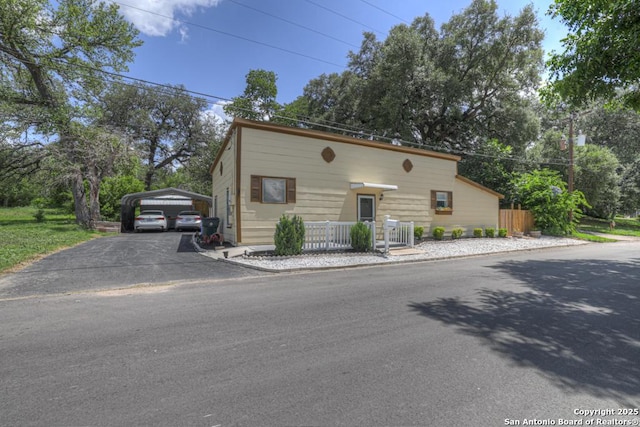 332 W Klein, Seguin, TX 78155 - view of front of property with a detached carport and asphalt driveway