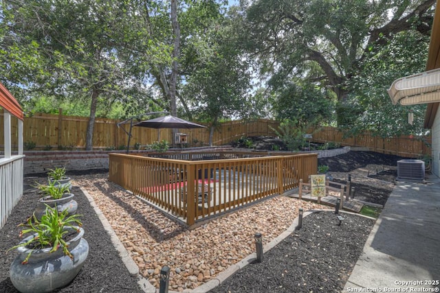332 W Klein, Seguin, TX 78155 - wooden terrace featuring a fenced backyard and a patio area