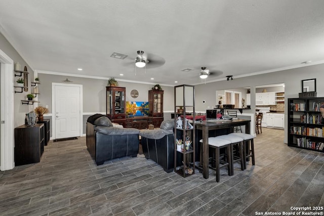 332 W Klein, Seguin, TX 78155 - living area featuring ceiling fan, wood finished floors, crown molding, and recessed lighting