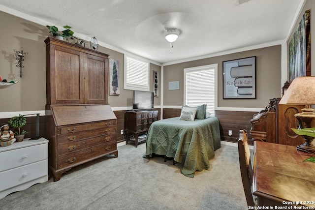 332 W Klein, Seguin, TX 78155 - bedroom featuring light colored carpet, a ceiling fan, crown molding, and a textured ceiling