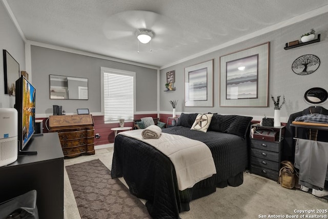 332 W Klein, Seguin, TX 78155 - carpeted bedroom featuring crown molding, a textured ceiling, and a ceiling fan