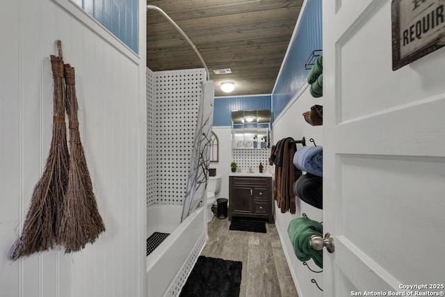 332 W Klein, Seguin, TX 78155 - bathroom with shower / tub combination, wood finished floors, and vanity