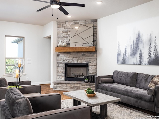 555 Mystic Pkwy, Spring Branch, TX 78070 - living area with ceiling fan, wood finished floors, and a fireplace