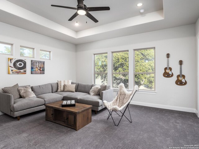 555 Mystic Pkwy, Spring Branch, TX 78070 - living area featuring a raised ceiling, ceiling fan, plenty of natural light, dark carpet, and recessed lighting