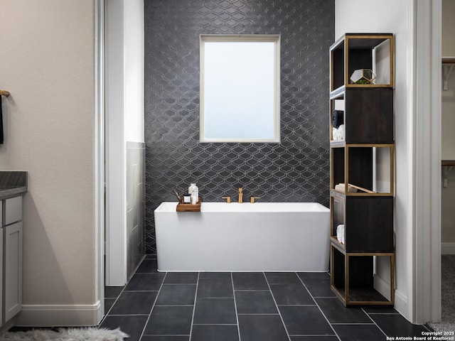 555 Mystic Pkwy, Spring Branch, TX 78070 - bathroom with a freestanding bath, tile patterned flooring, and vanity