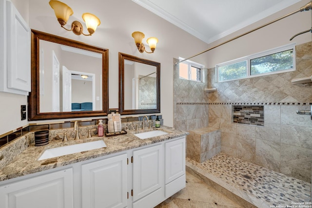 11546 Creek Bow, San Antonio, TX 78253 - bathroom with a tile shower, ornamental molding, and double vanity