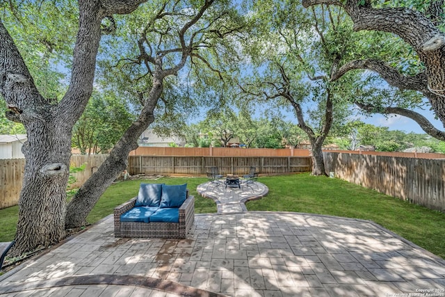 11546 Creek Bow, San Antonio, TX 78253 - fenced backyard featuring an outdoor fire pit and a patio area