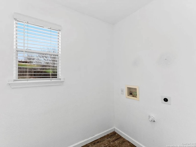 221 Peppergrass Cv, Kyle, TX 78640 - laundry room featuring electric dryer hookup, hookup for a washing machine, and dark wood-style floors