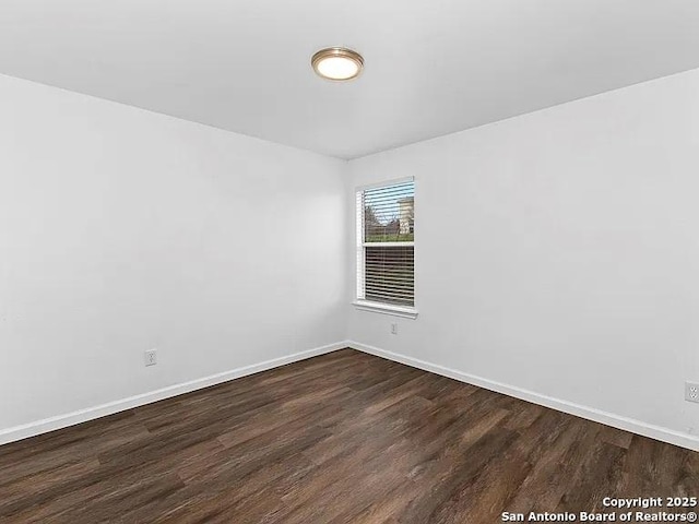 221 Peppergrass Cv, Kyle, TX 78640 - unfurnished room featuring dark wood finished floors and baseboards