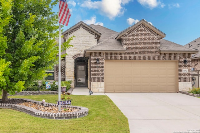 13822 Greater Straw, San Antonio, TX 78254 - french country inspired facade with stone siding, brick siding, an attached garage, driveway, and a front yard
