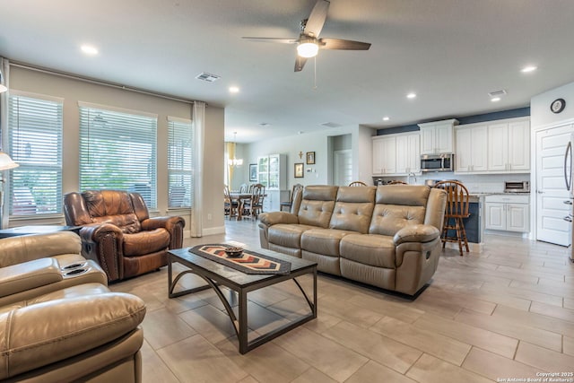 13822 Greater Straw, San Antonio, TX 78254 - living area with ceiling fan, recessed lighting, and a chandelier