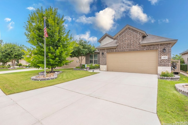 13822 Greater Straw, San Antonio, TX 78254 - view of front of home with brick siding, an attached garage, and a front yard