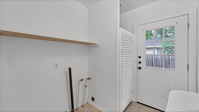 1261 Mill, New Braunfels, TX 78130 - laundry room featuring light tile patterned floors