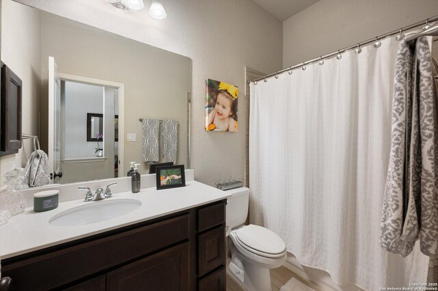 2129 Rustling Way, Seguin, TX 78155 - full bath with vanity and a shower with shower curtain
