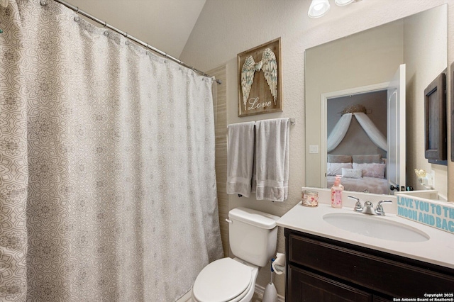 2129 Rustling Way, Seguin, TX 78155 - bathroom with vanity and lofted ceiling