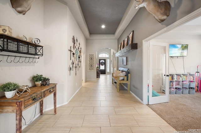 2129 Rustling Way, Seguin, TX 78155 - corridor with arched walkways, french doors, and recessed lighting