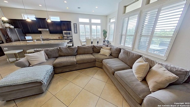 3822 Cordoba Crk, San Antonio, TX 78259 - living room with light tile patterned flooring and recessed lighting
