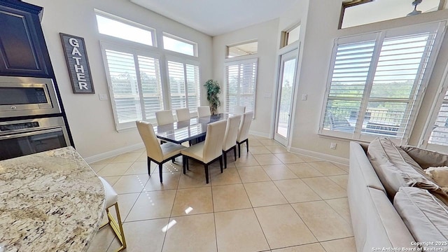 3822 Cordoba Crk, San Antonio, TX 78259 - dining area with healthy amount of natural light and light tile patterned flooring