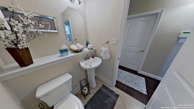 3822 Cordoba Crk, San Antonio, TX 78259 - half bath with toilet and tile patterned floors