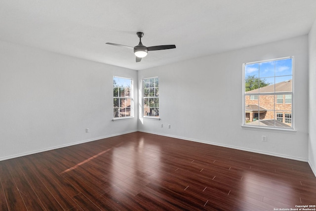 7622 Braes Stage, San Antonio, TX 78254 - unfurnished room with plenty of natural light, a ceiling fan, and dark wood-style flooring