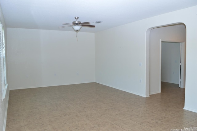 7431 Magnolia Blf, San Antonio, TX 78218 - spare room with a ceiling fan and arched walkways