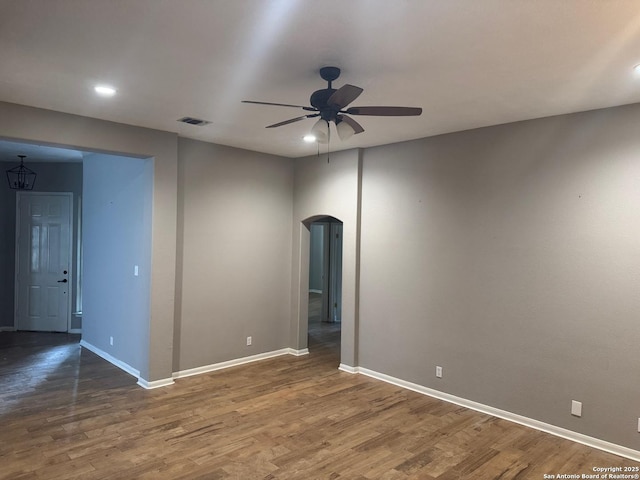 13711 Auburn Oaks, San Antonio, TX 78247 - spare room with arched walkways, a ceiling fan, wood finished floors, and recessed lighting