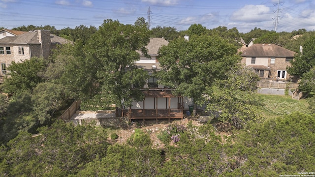 18510 Paloma Wood, San Antonio, TX 78259 - view of yard featuring a deck and view of wooded area