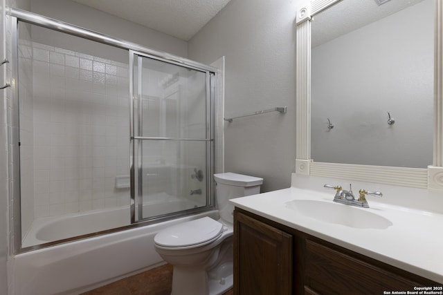 18510 Paloma Wood, San Antonio, TX 78259 - full bathroom with vanity, combined bath / shower with glass door, and a textured ceiling